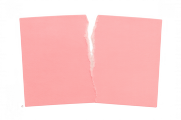 Torn pink paper creating split banner or breakup message, separating empty blank sheet with ripped edges