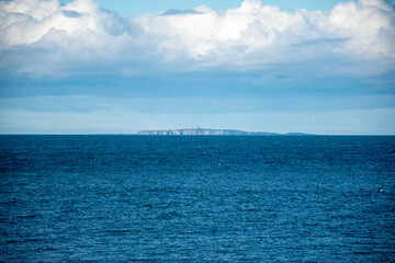 Distant view of Isle of May, a Scottish nature reserve known for its wildlife and maritime history.