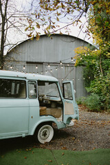 Obraz premium opened door in vintage blue bus