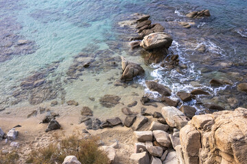 Serene Coastal View Featuring Crystal Clear Waters and a Rocky Shoreline
