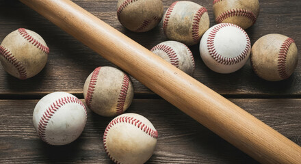"Vintage Baseball Still Life: Weathered Balls & Wooden Bat on Rustic Surface Evoke Game-Day Grit & Tradition" 