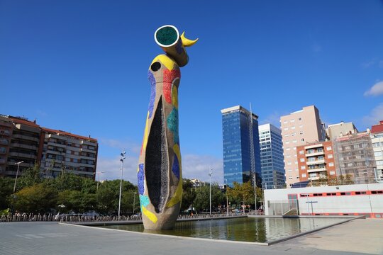BARCELONA, SPAIN - OCTOBER 8, 2021: Public park view: Parc de Joan Miro in Barcelona. The park features famous public space sculpture Dona i Ocell by artist Joan Miro, installed in 1983.