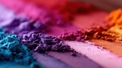An eye-catching array of vibrant powders in various colors creates a striking visual experience, embodying creativity and artistic expression on a textured surface.