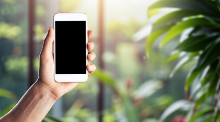 Man hand holding mobile phone with a blank screen