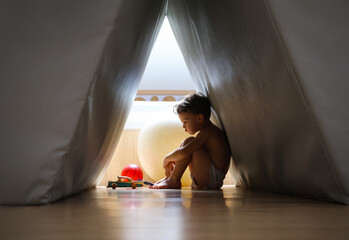  little three-year-old boy hid alone from the world in the shelter of his home.