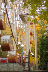 Autumn park. People are walking in the autumn park. Autumn yellow leaves.