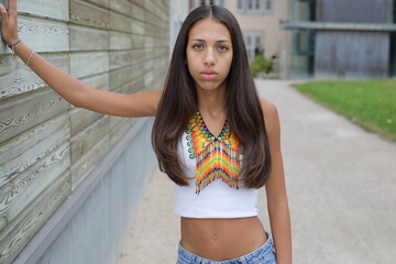 Native American girl with traditional colorful outfit 