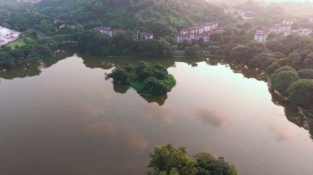 Aerial Drone View of beautiful Serpentine Lake with Central Island at IIT Guwahati 