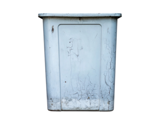 A weathered, white plastic container with visible cracks and signs of wear.