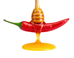 A vibrant red chili pepper drizzled with golden honey, showcasing a striking contrast of colors and textures. © TransPicHub