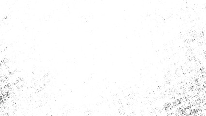 A white surface with scattered dark gray speckles and textured patterns in a distressed style.