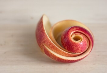 Spiral-shaped apple peel art
