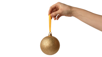 hand holding a golden Christmas ornament. Isolated on transparent background, png