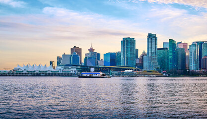 Vancouver skyline at sunset. View from Stanley Park. British Columbia, Canada