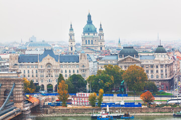 Fototapeta premium Budapest downtown district with view of Saint Stephen Basilica. Panoramic view of Budapest cityscape, showcasing historical architecture and the Danube River