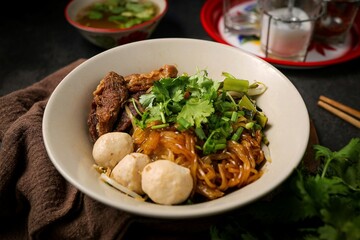 Steamed thin rice noodles without soup:in white bowl