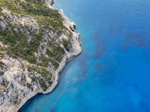 Aerial view of the Porto Katsiki beach, where the stark white cliffs meet the deep azure of the Ionian Sea, Lefkada, Lefkada, Greece.