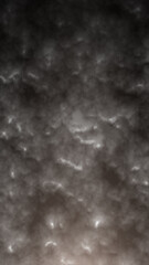 Dark cloudy texture with abstract fog patterns in monochrome grayscale