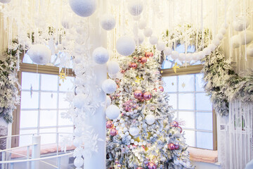 Fairytale Christmas decorations inside the Duma Tower. Stylish blue and pink decorations.