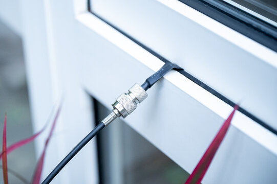 Coaxial cable window feed-through with SO-239 PL connectors for RG58, flat cable adapter for easy outdoor antenna setup in ham radio or CB radio applications