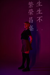 Stylish young woman embodies youth culture with vibrant colors and anime vibes at a modern venue