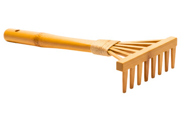 Small bamboo wood rake tool for a miniature zen garden isolated on a transparent background