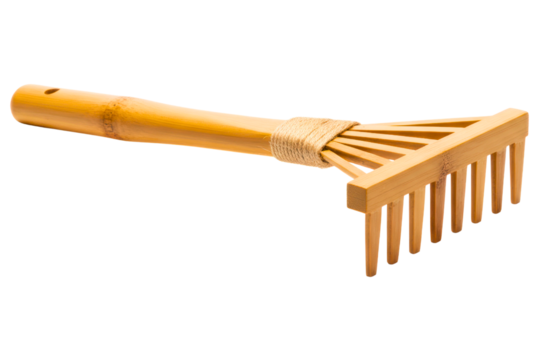Small bamboo wood rake tool for a miniature zen garden isolated on a transparent background