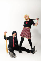 Youthful exuberance anime aesthetic with bats in studio