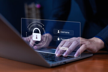Businessman typing on laptop with login security screen showing username and password fields. Concept of cybersecurity, online data protection, privacy access, digital authentication system technology
