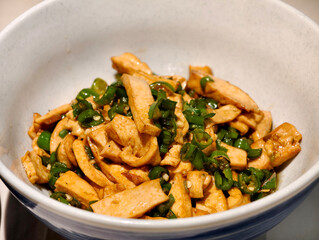 close up smoked tofu stir fried with green chili pepper. Chinese food
