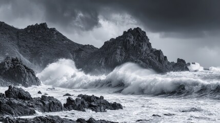 Dramatic ocean waves crashing on rocky shore under dark stormy sky
