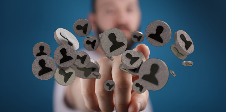 Man's hand interacting with social network icons, symbolising connection and community. Visual metaphor for networking.