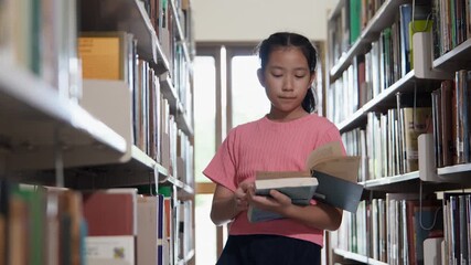 Young girl reading book in library filled with shelves, where education brings happiness and joy to every page. - Powered by Adobe
