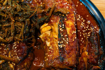spicy half-dried pollack braised with dried radish greens