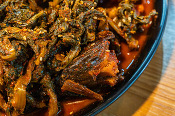 spicy half-dried pollack braised with dried radish greens