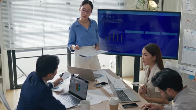 Group of creative Businesspeople brain storm meeting presentation,discussing roadmap to product launch, planning,strategy,dashboard,new business development,working with new startup project in office