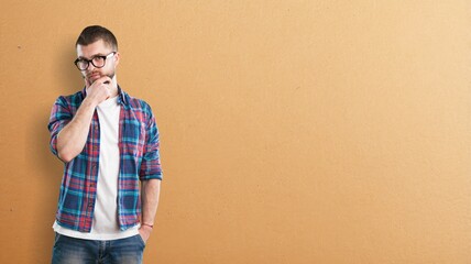 Young beard man think on abstract background