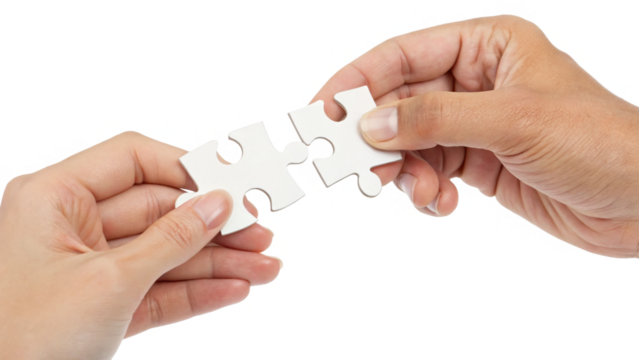 Hands connecting two white jigsaw puzzle pieces for a teamwork solution isolated on transparent background