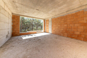  Interior of Unfinished Apartment with Brick Walls and Concrete Ceiling. Under Construction Residential Building, Real Estate Development, Industrial Architecture Background