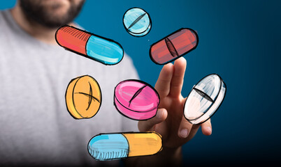 Image of hand interacting with colorful pills and capsules. Perfect for healthcare, medicine, pharmacy, and drug concepts.