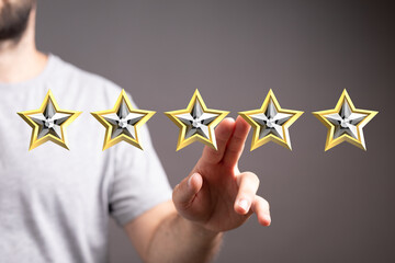 A hand interacting with five golden stars, representing evaluation, feedback, and achievement....