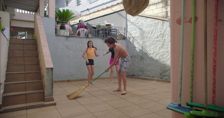 Friends playing together in outdoor space, jumping and laughing, having fun, carefree childhood moments, joyful, playful energy, family fun, active kids, sunshine