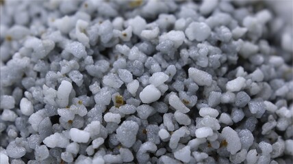Close-up of white granular material resembling perlite or lightweight aggregate