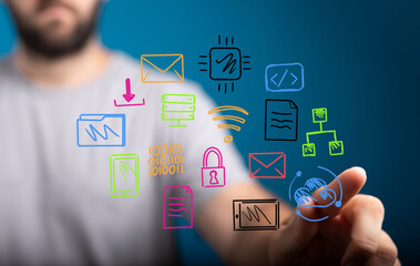 Hand pointing at digital icons,technology, network, data, communication, connection, innovation, digital transformation, cloud computing,