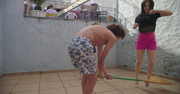 Friends playing together in outdoor space, jumping and laughing, having fun, carefree childhood moments, joyful, playful energy, family fun, active kids, sunshine - Powered by Adobe