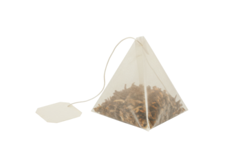 Isolated tea bag in the shape of a pyramid with a string and label; herbal infusion