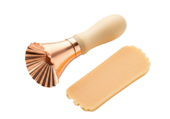 Isolated pastry wheel cutter tool and dough strip for ravioli making on neutral surface