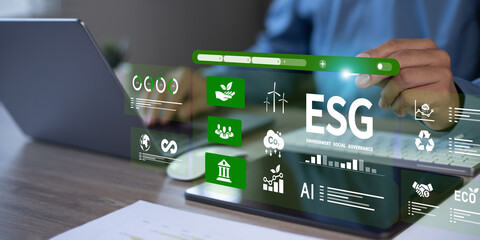 Businessman Analyzing Sustainable Investments with Green Icons and Charts, ESG Concept, Green Business, World Environment Day, ESG Carbon Emissions, Co2 to Net Zero