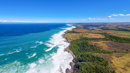 Aerial view of South Africa, rocky coast and white waves