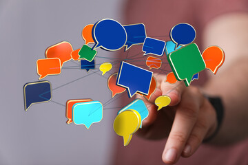 A vibrant array of communication bubbles surround a finger, representing digital interaction and connection in social media.